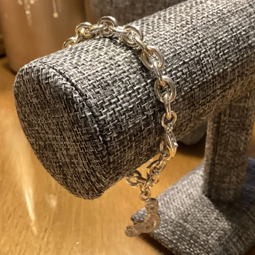 Silvertone Link Bracelet with Symbol Charm